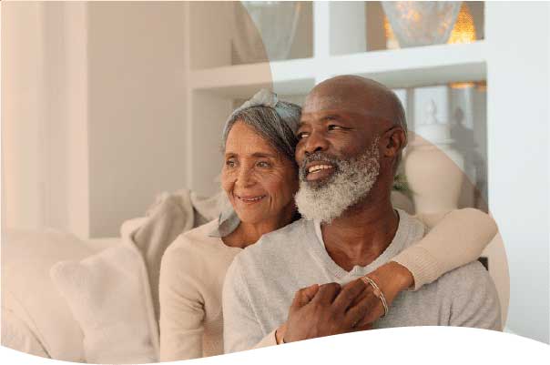 mixed-race mature couple smiling